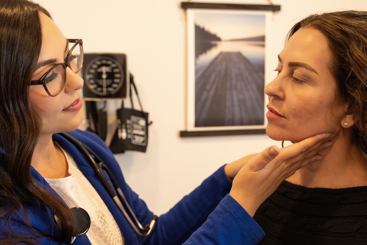 nurse practitioner with patient