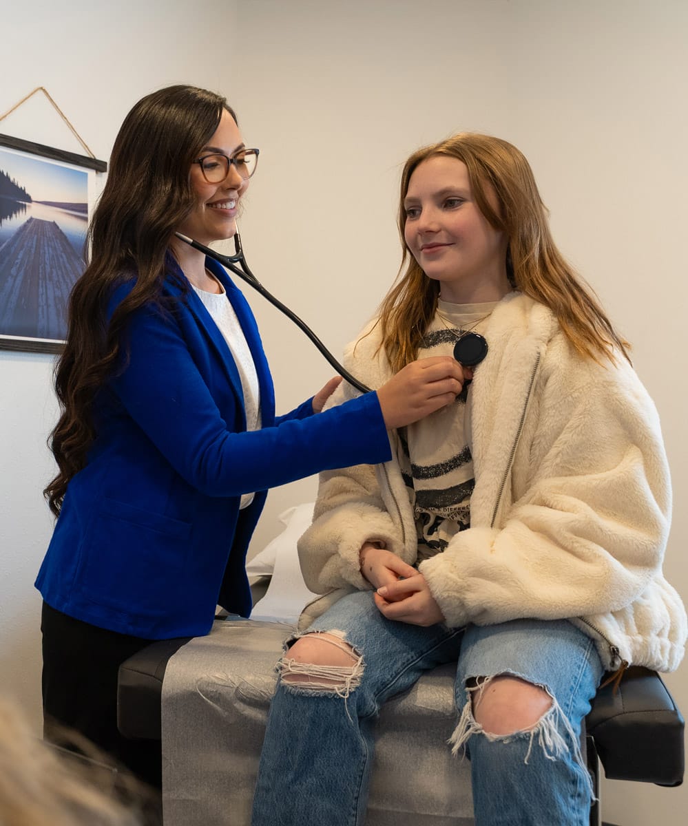 nurse practitioner with patient